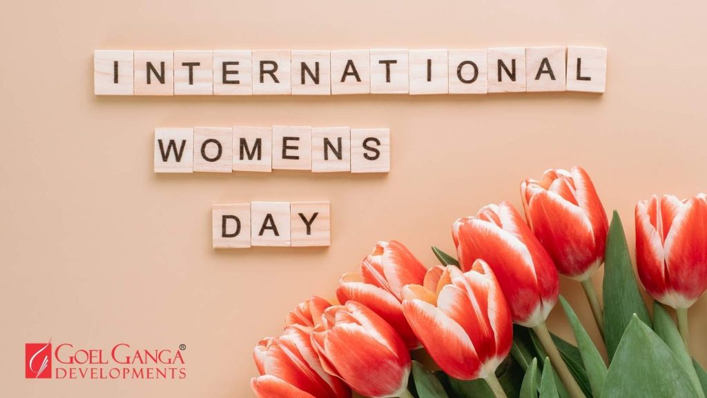 Confident woman reviewing financial plans and property investment documents representing financial independence and smart wealth planning.