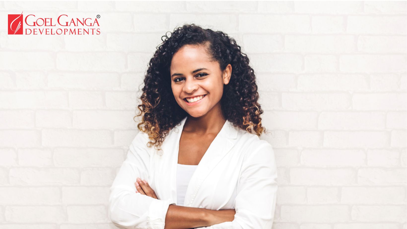 Confident woman reviewing plans for a modern residential project, representing the growing influence of women homebuyers in India's real estate market.